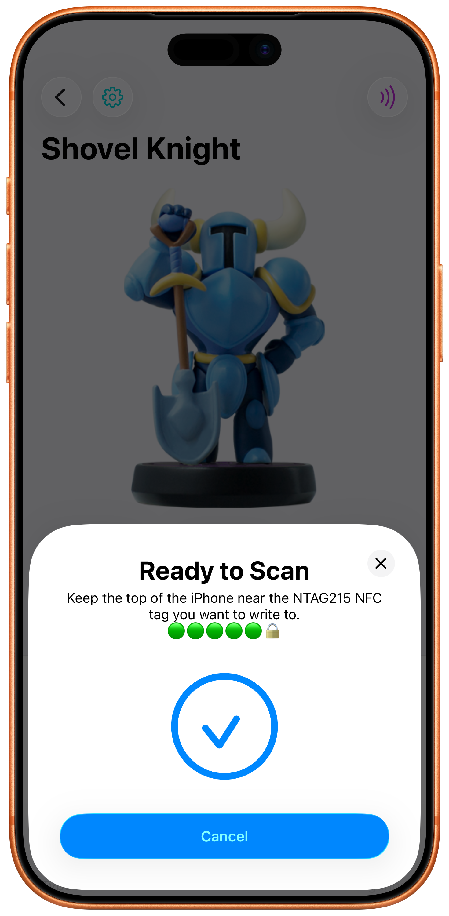 Screen showing the Shovel Knight amiibo in the background with in the foreground a successful NFC writing alert